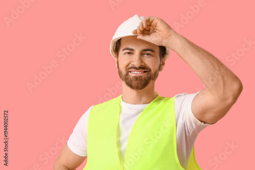 Young happy male constructi...