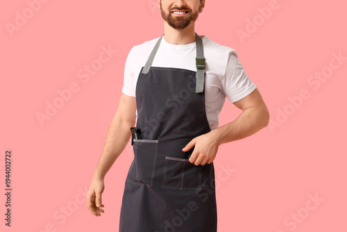 Young happy male hairdresse...