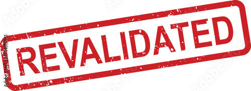 A red grunge rubber stamp showing the significant word REVALIDATED is clearly visible on a bright white surface