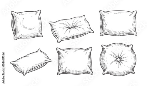 Six black and white style pillows in various shapes and stitching patterns square