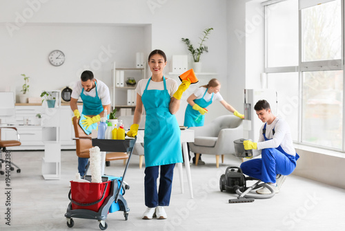 Female Asian janitor with t...