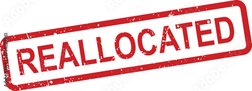 A vibrant red grunge rubber stamp prominently features the word REALLOCATED against a plain white backdrop