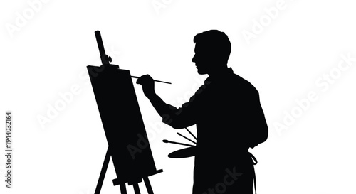 Silhouette of an artist painting at an easel against a white background