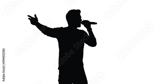 Silhouette of a singer performing with a microphone on stage