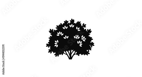 Silhouette of a lush leafy tree with intricate branches