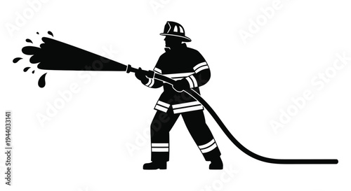 A silhouetted firefighter directs a powerful stream of water from a hose