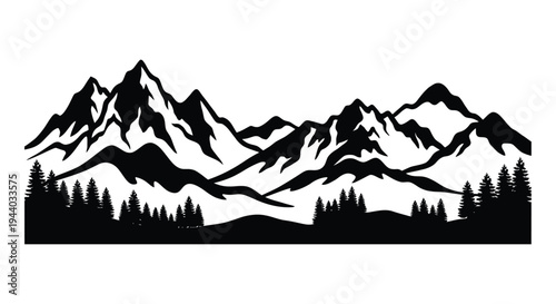 Dramatic mountain range silhouette with evergreen trees below