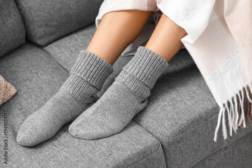 Woman wearing warm knitted ...