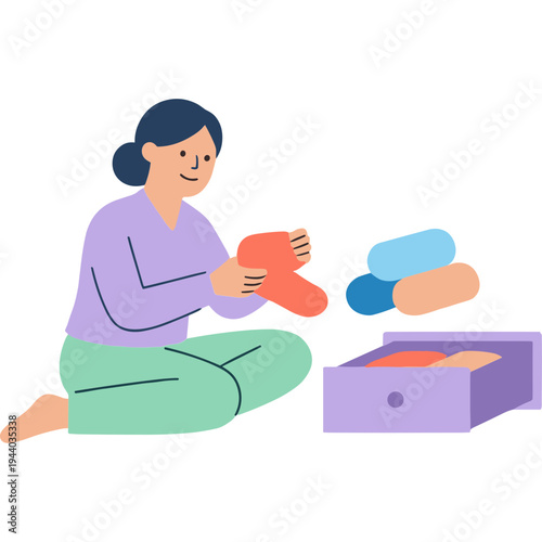 Woman sitting on floor holding sock near open box with more socks
