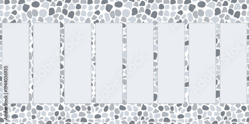 Outdoors large format tiles lying on gravel.