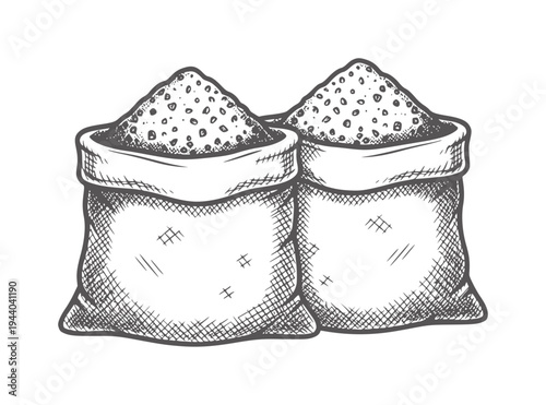 Two burlap sacks filled with granular bags powder