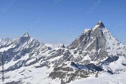 Billede på lærred The Matterhorn, a panoramic peak between Italy and Switzerland, seen from the ski slopes