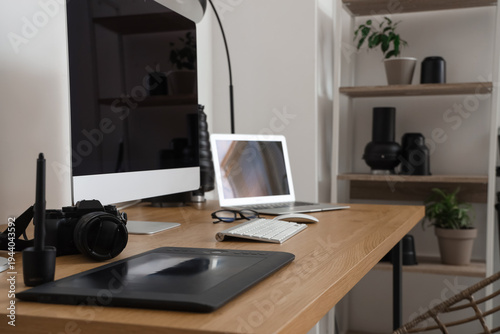 Table with modern computer,...