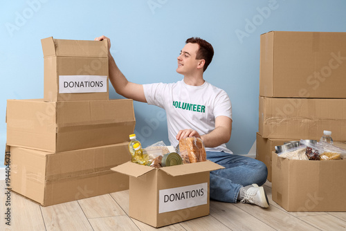 Male volunteer with donatio...