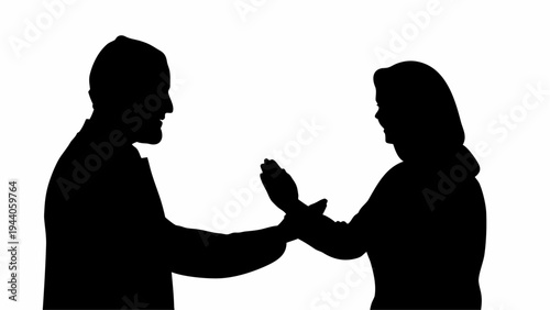 Muslim couple greeting each other with handshake or namaste two silhouettes in black against white background