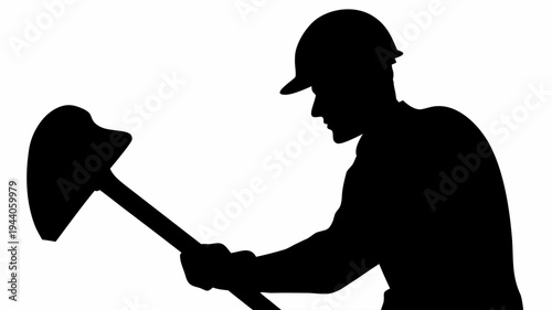 Worker in silhouette digging with shovel manual labor concept hard hat and tool industrial action