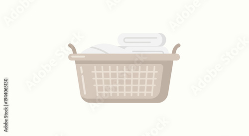 Laundry basket filled with clean white folded towels.