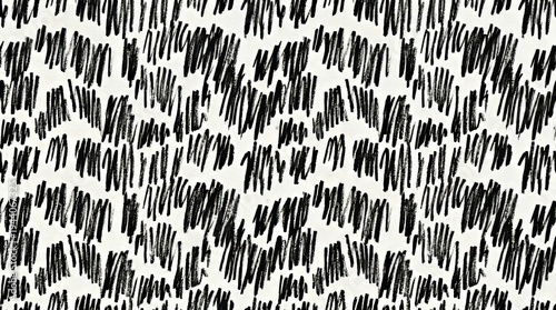 Seamless abstract hand drawn black ink scribble pattern on white background for fabric and wallpaper design.
