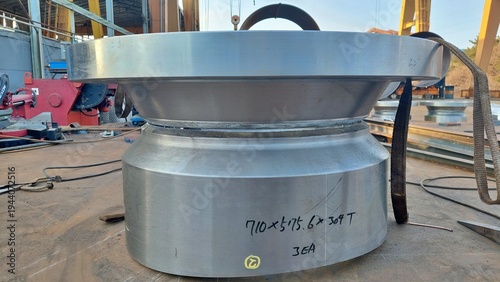 Canvastavla Large machined steel flanges for industrial piping system in workshop