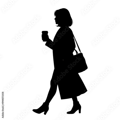 A silhouette of a woman walking with a coffee cup