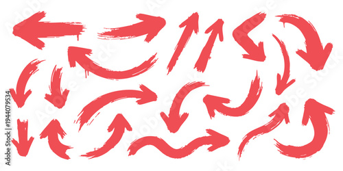 Set of red hand drawn arrows in various shapes and directions on white background