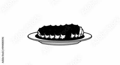 A dark, rectangular pastry is presented on a white plate with a decorative rim