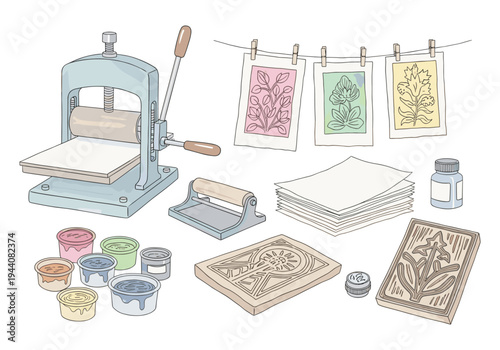 Linocut printing supplies and artwork displayed, showcasing a creative process