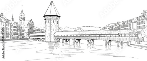 Historic wooden bridge and tower over water with European buildings