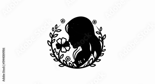 Silhouette of a girl with flowers and leaves in a circular frame