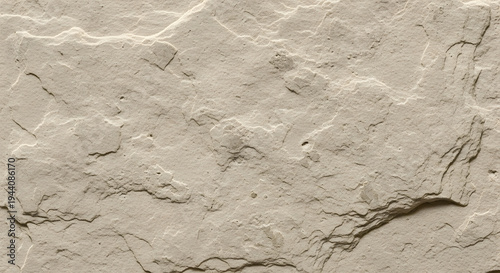 Beige cracked plaster wall texture with natural rough surface and architectural material details forming realistic background for construction and interior design