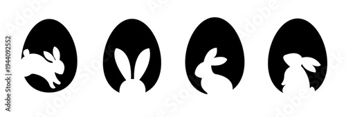 A set of black egg silhouettes in the form of Easter bunny icons, isolated on a transparent PNG background. Vector.