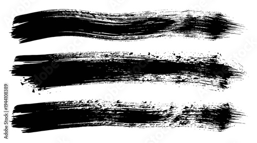 Abstract black brush strokes on white background, ideal for artistic designs and backgrounds