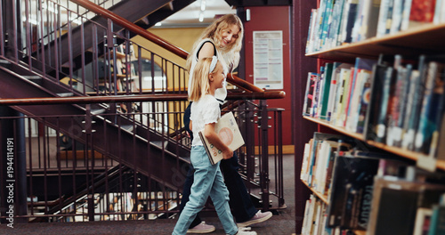 Tableau sur toile Mother, daughter and walk in library with book, knowledge support or bonding together for development