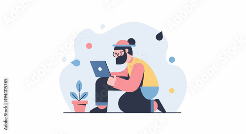 Bearded person in pink and yellow shirt kneeling with laptop, potted plant nearby