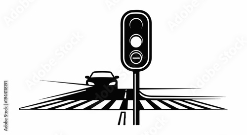 Car approaching a traffic light at a crosswalk