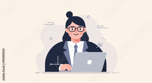 A smiling person in glasses wears a suit and tie, working on a laptop