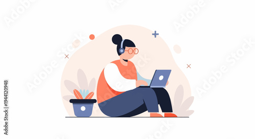 Person wearing headphones and glasses works on laptop