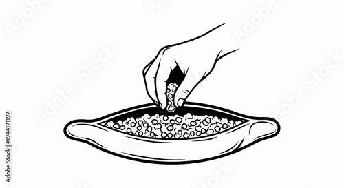 Hand adding small pebbles to a bowl of round objects