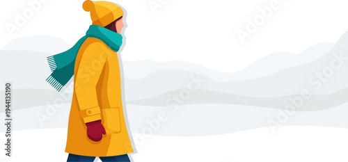 Individual in a yellow parka walks across a snowy field