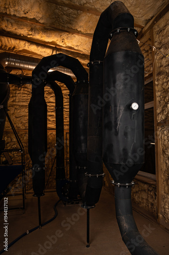 Pellet production in a factory. Heating a house with pellets. Pellet manufacturing process and its storage.