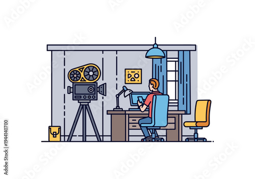 Filmmaker working on computer next to vintage camera in a studio setting