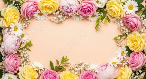 A floral border with pink and yellow roses and white daisies