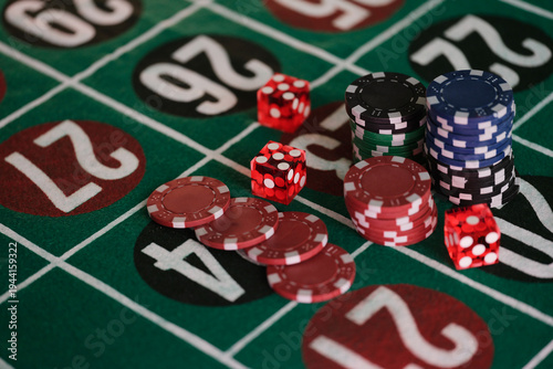 Players gather around the roulette table, colorful chips piled high beside red and black dice. The atmosphere buzzes with hope as everyone eagerly anticipates the next spin.