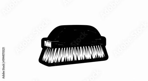 Black brush with white bristles against a stark white background