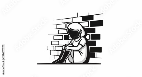 Child sitting alone against a brick wall, with a shadow obscuring their face