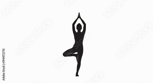 Silhouette of a person in a Tree Pose, arms overhead