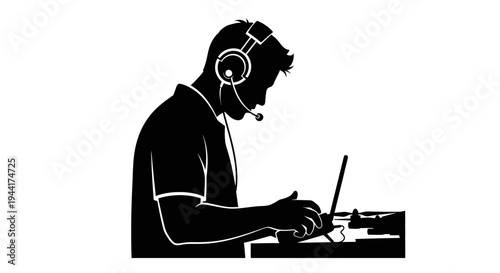 Silhouette of a gamer wearing headphones with microphone, playing on a laptop