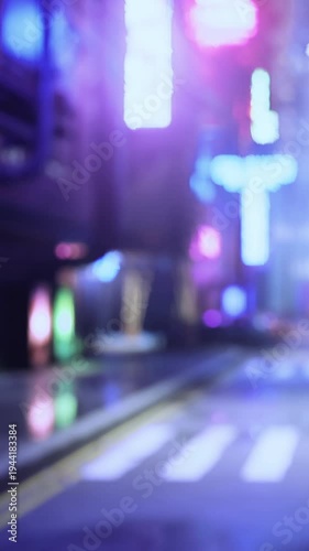 Wallpaper Mural A city street is illuminated by bright neon lights at night. The road appears empty with colorful reflections on the pavement and signs glowing in the distance. Torontodigital.ca