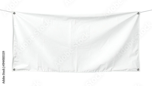 A large white fabric banner hanging on a string in a bright room