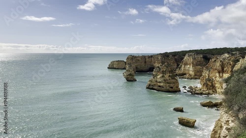 Landscape with beautiful Praia da Marinha, one of the most famous beaches of Portugal, located on the Atlantic coast in Lagoa, Algarve.